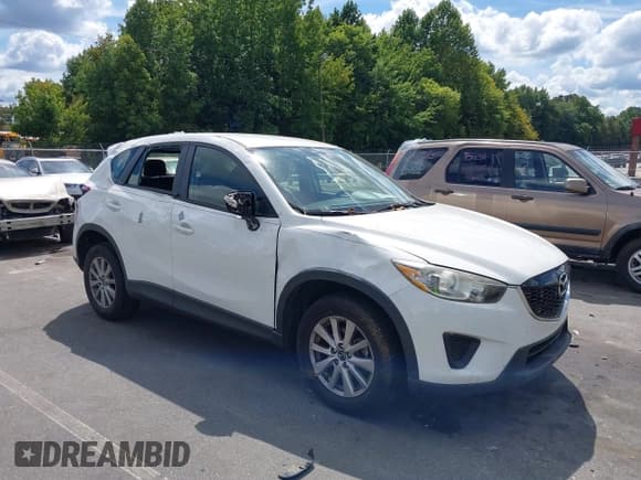 ✅ 2015 Mazda CX-5 Sport • VIN: JM3KE4BY1F0553258 • Lot: 43117276. Wystawiony na IAAI z przebiegiem 90 506 mil. Bezpłatny archiwum sprzedaży aukcyjnych z USA i szczegółowy raport historii pojazdu na DreamBid. Zdjęcie 1.