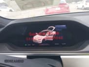 ✅ 2023 Tesla Model S Plaid • VIN: 5YJSA1E63PF521945 • Lot: 43248046. Listed on IAAI with 26,327 mi. Free auction sales archive from the USA and detailed vehicle history report at DreamBid. Image 7.