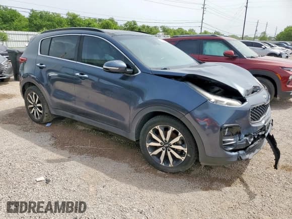 ✅ 2019 Kia Sportage EX • VIN: KNDPN3AC7K7546444 • Lot: 56114315. Listed on Copart with 97,656 mi. Free auction sales archive from the USA and detailed vehicle history report at DreamBid. Image 4.