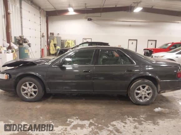 ✅ 2001 Cadillac Seville Luxury SLS • VIN: 1G6KS54Y61U260481 • Lot: 43653983. Wystawiony na IAAI z przebiegiem 181 493 mil. Bezpłatny archiwum sprzedaży aukcyjnych z USA i szczegółowy raport historii pojazdu na DreamBid. Zdjęcie 14.