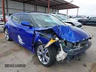 2012 Hyundai Veloster w/Black Int with VIN KMHTC6AD8CU067589, listed as a IAAI auction lot 43408833 with 159,802 mi miles and . Bid and sale history available at DreamBid. Image 1.