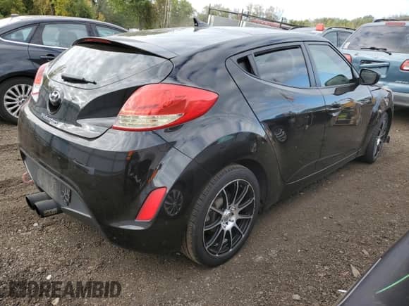2014 Hyundai Veloster с VIN KMHTC6AD1EU189049, выставлен на аукционе Copart как лот 73875184 с пробегом 155 119 миль миль и Списание • Salvage title. История ставок и продаж доступна на DreamBid. Изображение 3.