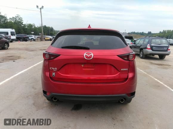 ✅ 2021 Mazda CX-5 Touring • VIN: JM3KFBCMXM1303358 • Lot: 42829675. Wystawiony na IAAI z przebiegiem 53 848 mil. Bezpłatny archiwum sprzedaży aukcyjnych z USA i szczegółowy raport historii pojazdu na DreamBid. Zdjęcie 16.