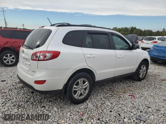 ✅ 2012 Hyundai Santa Fe GLS • VIN: 5XYZGDAB2CG151401 • Lot: 72714994. Listed on Copart with 123,518 mi. Free auction sales archive from the USA and detailed vehicle history report at DreamBid. Image 3.