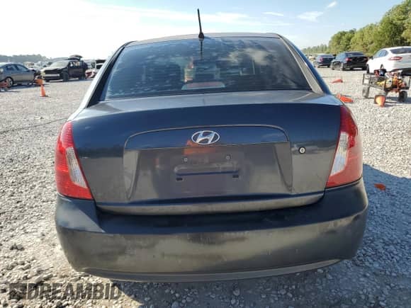 2007 Hyundai Accent GLS z VIN KMHCN46C57U103209, wystawiony jako Copart lot #74140414 z przebiegiem 191 880 mil mil oraz Szkoda całkowita • Salvage title. Historia ofert i sprzedaży dostępna na DreamBid. Obrazek 6.