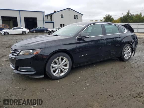 2017 Chevrolet Impala LT z VIN 2G1105S38H9185689, wystawiony jako Copart lot #86317055 z przebiegiem 128 364 mil mil oraz Szkoda całkowita • Salvage title. Historia ofert i sprzedaży dostępna na DreamBid. Obrazek 1.
