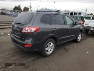 ✅ 2012 Hyundai Santa Fe GLS • VIN: 5XYZGDAB2CG104577 • Lot: 81955304. Listed on Copart with 99,407 mi. Free auction sales archive from the USA and detailed vehicle history report at DreamBid. Image 3.