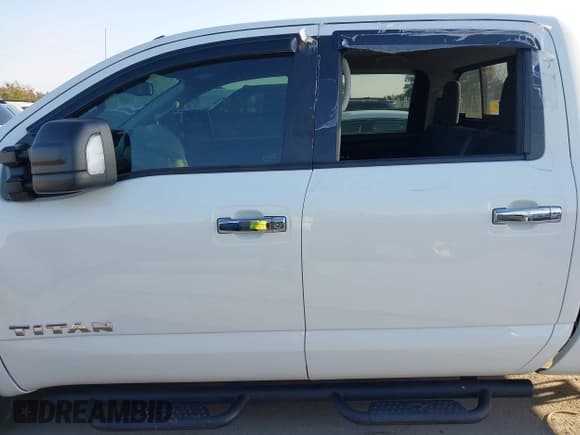 ✅ 2021 Nissan Titan SV • VIN: 1N6AA1EF8MN506539 • Lot: 43720616. Listed on IAAI with 21,204 mi. Free auction sales archive from the USA and detailed vehicle history report at DreamBid. Image 14.