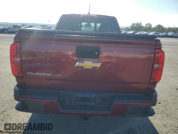 ✅ 2018 Chevrolet Colorado 4WD Z71 • VIN: 1GCGTDEN9J1198705 • Лот: 81648585. Опубликован ранее на Copart с пробегом 48 445 миль. Бесплатный доступ к архиву аукционных продаж из США и подробный отчёт об истории автомобиля на DreamBid. Изображение 6.