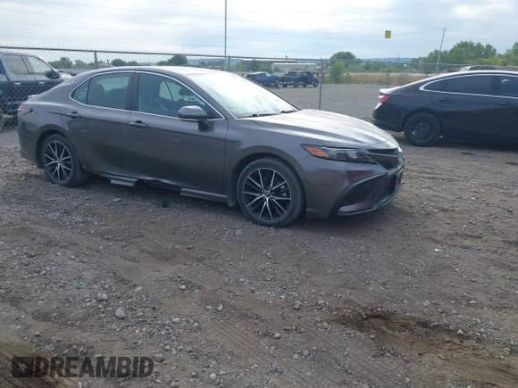 2022 Toyota Camry SE with VIN 4T1G11BK7NU049434, listed as a IAAI auction lot 43099991 with 36,395 mi miles and . Bid and sale history available at DreamBid. Image 1.