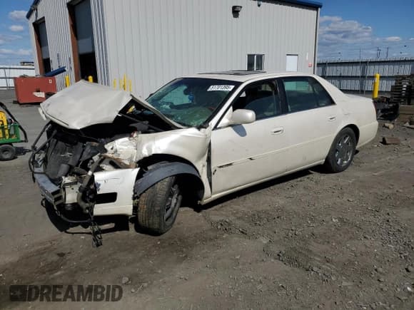 ✅ 2001 Cadillac DeVille DTS • VIN: 1G6KF57931U175090 • Lot: 51701395. Listed on Copart with 121,578 mi. Free auction sales archive from the USA and detailed vehicle history report at DreamBid. Image 1.