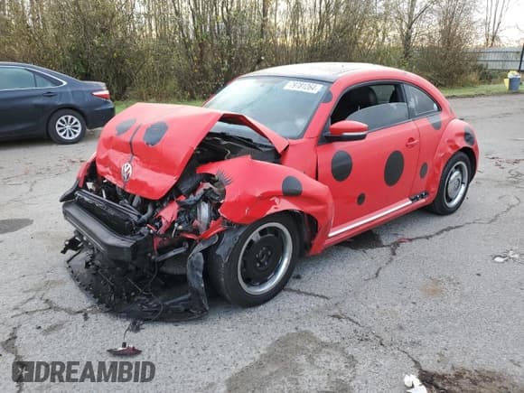 ✅ 2013 Volkswagen Beetle 2.5L • VIN: 3VWHX7AT8DM604332 • Lot: 79781264. Listed on Copart with 125,692 mi. Free auction sales archive from the USA and detailed vehicle history report at DreamBid. Image 1.