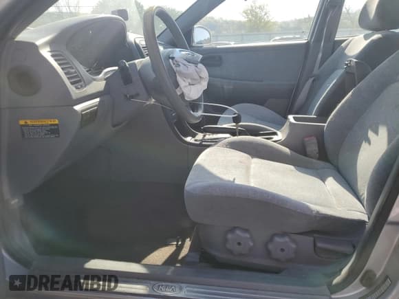 ✅ 2004 Kia Optima LX • VIN: KNAGD126045301139 • Lot: 52876615. Listed on Copart with 165,480 mi. Free auction sales archive from the USA and detailed vehicle history report at DreamBid. Image 7.