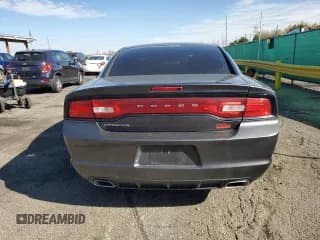 ✅ 2014 Dodge Charger SE • VIN: 2C3CDXBG1EH169021 • Lot: 90097535. Listed on Copart with 125,335 mi. Free auction sales archive from the USA and detailed vehicle history report at DreamBid. Image 6.