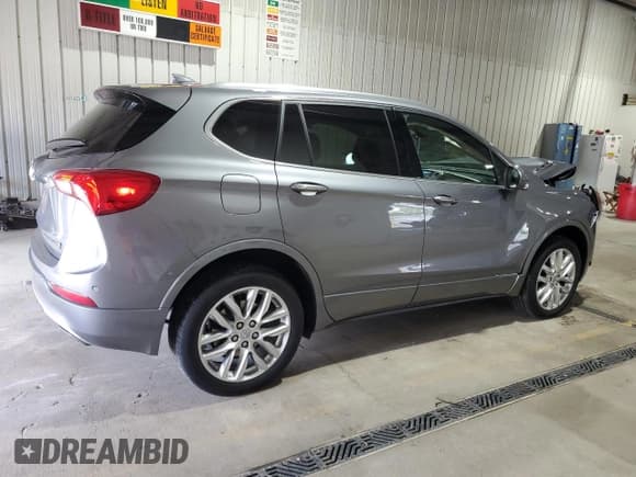 ✅ 2020 Buick Envision Premium • VIN: LRBFX3SX0LD137999 • Лот: 70746225. Опубликован ранее на Copart с пробегом 56 953 миль. Бесплатный доступ к архиву аукционных продаж из США и подробный отчёт об истории автомобиля на DreamBid. Изображение 3.