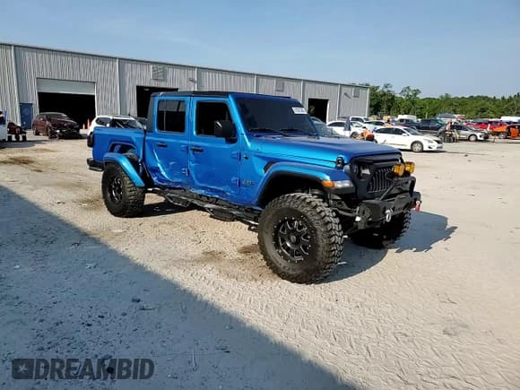 ✅ 2020 Jeep Gladiator Overland • VIN: 1C6HJTFG4LL162262 • Lot: 57261325. Wystawiony na Copart z przebiegiem 74 856 mil. Bezpłatny archiwum sprzedaży aukcyjnych z USA i szczegółowy raport historii pojazdu na DreamBid. Zdjęcie 13.