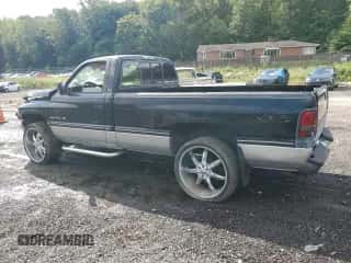 1994 Dodge 1500 z VIN 3B7HC16Y5RM530651, wystawiony jako Copart lot #74453654 z przebiegiem 83 562 mil mil oraz Szkoda całkowita • Salvage title. Historia ofert i sprzedaży dostępna na DreamBid. Obrazek 2.