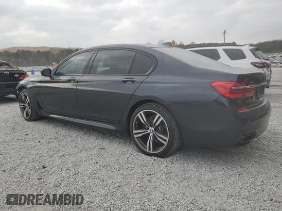 ✅ 2016 BMW 7 Series 750i xDrive • VIN: WBA7F2C58GG420569 • Lot: 92807105. Wystawiony na Copart z przebiegiem 48 157 mil. Bezpłatny archiwum sprzedaży aukcyjnych z USA i szczegółowy raport historii pojazdu na DreamBid. Zdjęcie 2.