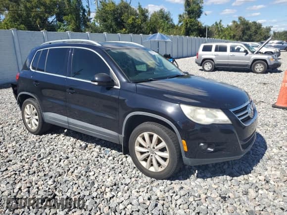 ✅ 2011 Volkswagen Tiguan S • VIN: WVGAV7AX7BW526793 • Lot: 90085525. Listed on Copart with 135,514 mi. Free auction sales archive from the USA and detailed vehicle history report at DreamBid. Image 4.