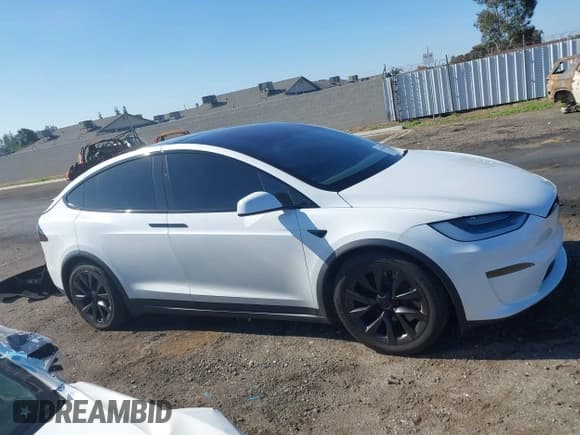 ✅ 2022 Tesla Model X • VIN: 7SAXCAE54NF362277 • Lot: 43643635. Wystawiony na IAAI z przebiegiem 53 073 mil. Bezpłatny archiwum sprzedaży aukcyjnych z USA i szczegółowy raport historii pojazdu na DreamBid. Zdjęcie 14.
