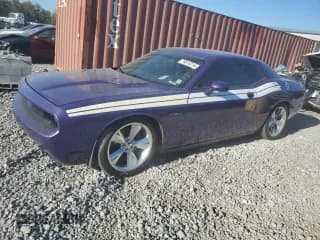 ✅ 2014 Dodge Challenger R/T Classic • VIN: 2C3CDYBTXEH205369 • Lot: 76815314. Wystawiony na Copart z przebiegiem 153 744 mil. Bezpłatny archiwum sprzedaży aukcyjnych z USA i szczegółowy raport historii pojazdu na DreamBid. Zdjęcie 1.