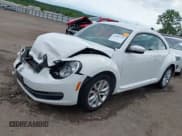 ✅ 2014 Volkswagen Beetle 2.0L TDI w/Sun/Sound/Nav • VIN: 3VWJL7AT1EM621584 • Лот: 42340715. Опубликован ранее на IAAI с пробегом 92 443 миль. Бесплатный доступ к архиву аукционных продаж из США и подробный отчёт об истории автомобиля на DreamBid. Изображение 18.