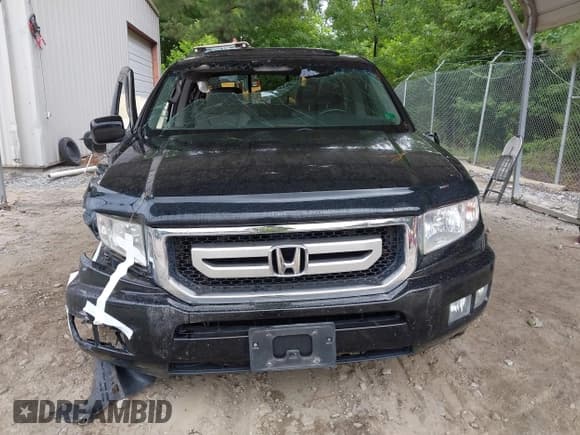 ✅ 2011 Honda Ridgeline RTL • VIN: 5FPYK1F58BB453252 • Лот: 42657609. Опубликован ранее на IAAI с пробегом 166 228 миль. Бесплатный доступ к архиву аукционных продаж из США и подробный отчёт об истории автомобиля на DreamBid. Изображение 6.