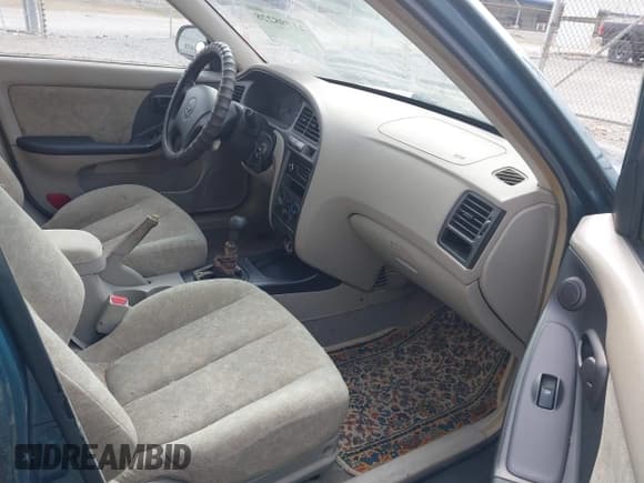 ✅ 2002 Hyundai Elantra GLS • VIN: KMHDN45DX2U299123 • Lot: 41798228. Wystawiony na IAAI z przebiegiem 202 200 mil. Bezpłatny archiwum sprzedaży aukcyjnych z USA i szczegółowy raport historii pojazdu na DreamBid. Zdjęcie 5.