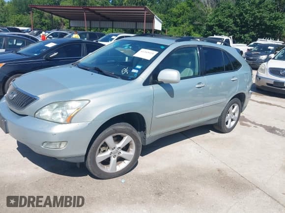 ✅ 2007 Lexus RX 350 • VIN: 2T2HK31UX7C024222 • Lot: 42245924. Listed on IAAI with 228,442 mi. Free auction sales archive from the USA and detailed vehicle history report at DreamBid. Image 2.