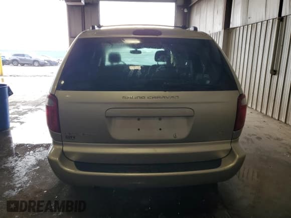 ✅ 2005 Dodge Caravan SXT • VIN: 2D4GP44L95R240475 • Лот: 86502335. Опубликован ранее на Copart с пробегом 124 710 миль. Бесплатный доступ к архиву аукционных продаж из США и подробный отчёт об истории автомобиля на DreamBid. Изображение 6.