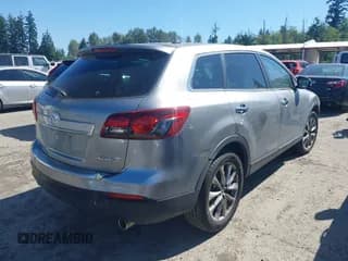 ✅ 2014 Mazda CX-9 Grand Touring • VIN: JM3TB2DA9E0435295 • Лот: 42853292. Опубликован ранее на IAAI с пробегом 177 783 миль. Бесплатный доступ к архиву аукционных продаж из США и подробный отчёт об истории автомобиля на DreamBid. Изображение 4.