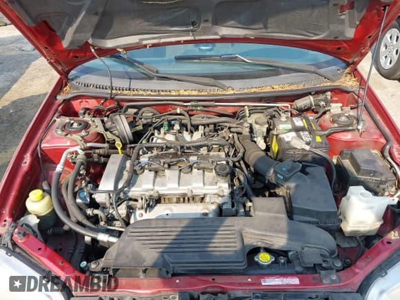 ✅ 2002 Mazda Protege DX • VIN: JM1BJ225520501057 • Lot: 42979132. Wystawiony na IAAI z przebiegiem 140 232 mil. Bezpłatny archiwum sprzedaży aukcyjnych z USA i szczegółowy raport historii pojazdu na DreamBid. Zdjęcie 10.