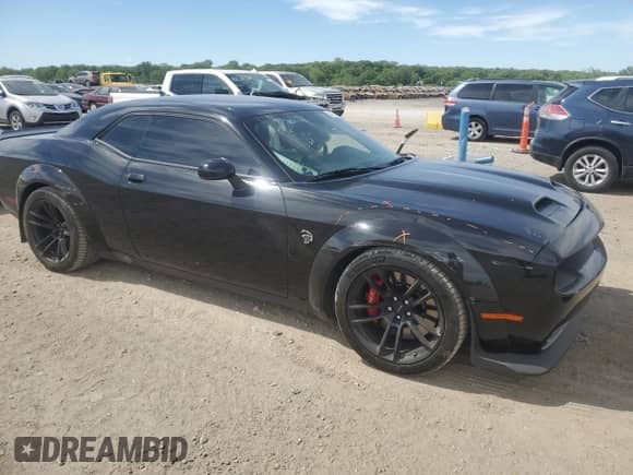 2021 Dodge Challenger SRT Hellcat with VIN 2C3CDZC99MH680244, listed as a Copart auction lot 56312265 with 30,057 mi miles and Salvage title. Bid and sale history available at DreamBid. Image 4.