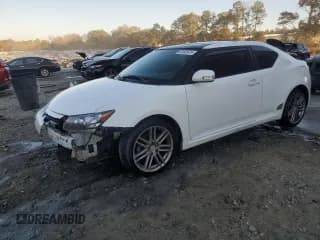 ✅ 2011 Scion tC • VIN: JTKJF5C70B3007307 • Lot: 92492475. Listed on Copart with 187,750 mi. Free auction sales archive from the USA and detailed vehicle history report at DreamBid. Image 1.