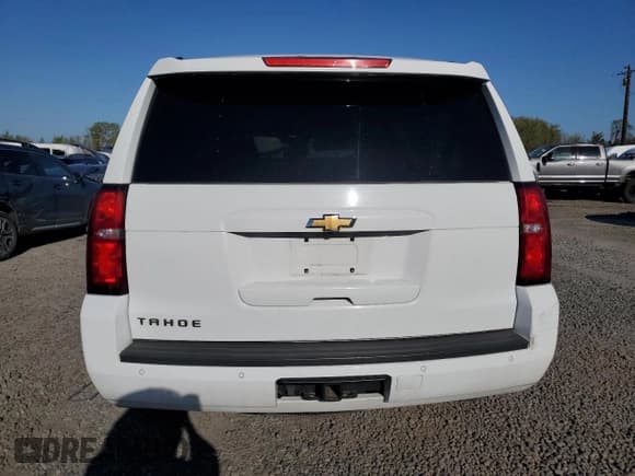 ✅ 2020 Chevrolet Tahoe LT • VIN: 1GNSKBKC5LR243378 • Lot: 52690775. Listed on Copart with 79,900 mi. Free auction sales archive from the USA and detailed vehicle history report at DreamBid. Image 6.