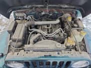 ✅ 2001 Jeep Wrangler Sahara • VIN: 1J4FA59S01P310998 • Лот: 94724805. Опубликован ранее на Copart с пробегом 113 902 миль. Бесплатный доступ к архиву аукционных продаж из США и подробный отчёт об истории автомобиля на DreamBid. Изображение 11.