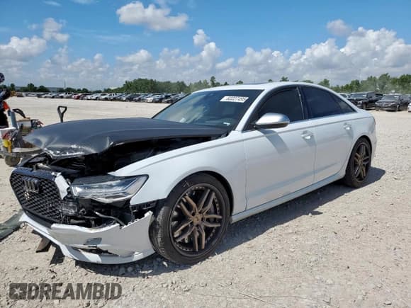 ✅ 2013 Audi S6 • VIN: WAUF2CFCXDN084096 • Лот: 62227495. Опубликован ранее на Copart с пробегом 99 899 миль. Бесплатный доступ к архиву аукционных продаж из США и подробный отчёт об истории автомобиля на DreamBid. Изображение 1.