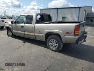 2001 Chevrolet Silverado 1500 LS z VIN 1GCEK19T41Z189543, wystawiony jako Copart lot #62922784 z przebiegiem 157 821 mil mil oraz Szkoda całkowita • Salvage title. Historia ofert i sprzedaży dostępna na DreamBid. Obrazek 2.