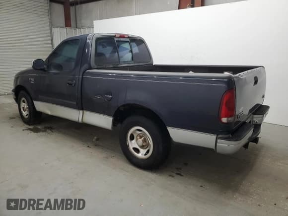 ✅ 2000 Ford F-150 XL • VIN: 1FTRF17L1YNA61061 • Lot: 87430655. Listed on Copart with 274,470 mi. Free auction sales archive from the USA and detailed vehicle history report at DreamBid. Image 2.