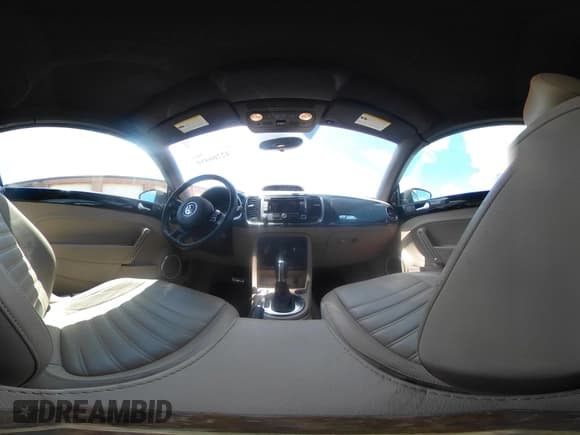 ✅ 2013 Volkswagen Beetle 2.0T w/Sound/Nav • VIN: 3VW7A7AT5DM801567 • Лот: 42266410. Опубликован ранее на IAAI с пробегом 37 190 миль. Бесплатный доступ к архиву аукционных продаж из США и подробный отчёт об истории автомобиля на DreamBid. Изображение 19.