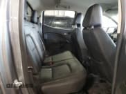 ✅ 2021 Chevrolet Colorado 4WD Z71 • VIN: 1GCGTDEN0M1130524 • Лот: 59906174. Опубликован ранее на Copart с пробегом 74 107 миль. Бесплатный доступ к архиву аукционных продаж из США и подробный отчёт об истории автомобиля на DreamBid. Изображение 10.