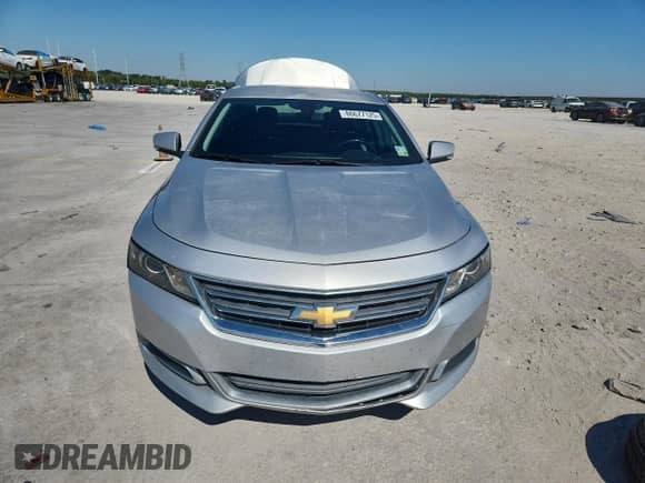 2017 Chevrolet Impala LT with VIN 1G1105SA4HU143554, listed as a Copart auction lot 86677125 with 198,009 mi miles and Salvage title. Bid and sale history available at DreamBid. Image 5.