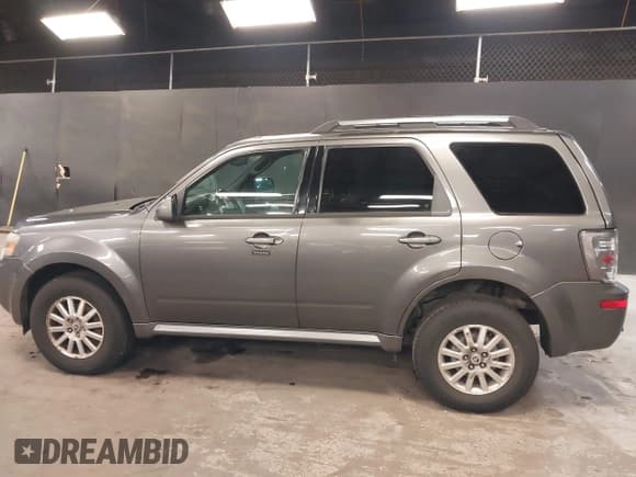 ✅ 2010 Mercury Mariner Premier • VIN: 4M2CN9HGXAKJ28184 • Lot: 42480802. Wystawiony na IAAI z przebiegiem 145 645 mil. Bezpłatny archiwum sprzedaży aukcyjnych z USA i szczegółowy raport historii pojazdu na DreamBid. Zdjęcie 14.