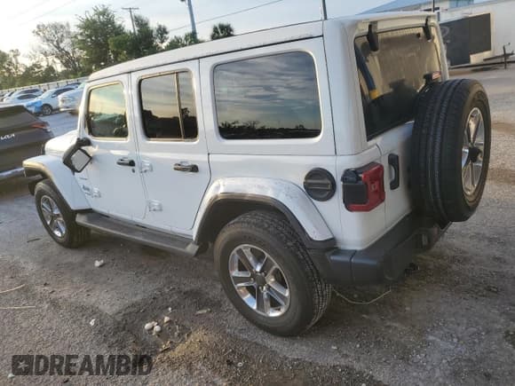 ✅ 2022 Jeep Wrangler Unlimited Sahara • VIN: 1C4HJXEN1NW124022 • Lot: 71612885. Listed on Copart with 16,609 mi. Free auction sales archive from the USA and detailed vehicle history report at DreamBid. Image 2.