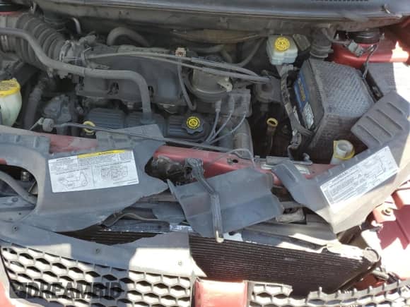 2004 Dodge Caravan SXT z VIN 2D4GP44L54R570404, wystawiony jako Copart lot #56646824 z przebiegiem 239 162 mil mil oraz Szkoda całkowita • Salvage title. Historia ofert i sprzedaży dostępna na DreamBid. Obrazek 12.