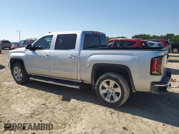✅ 2018 GMC Sierra 1500 SLT • VIN: 3GTU2NEC6JG602040 • Лот: 61049375. Опубликован ранее на Copart с пробегом 144 091 миль. Бесплатный доступ к архиву аукционных продаж из США и подробный отчёт об истории автомобиля на DreamBid. Изображение 2.