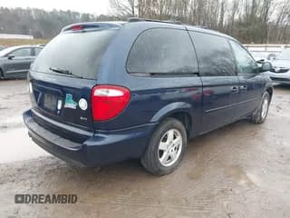 ✅ 2005 Dodge Caravan SXT • VIN: 2D4GP44L65R148904 • Lot: 43863888. Listed on IAAI with 142,934 mi. Free auction sales archive from the USA and detailed vehicle history report at DreamBid. Image 4.