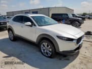 ✅ 2022 Mazda CX-30 S Premium • VIN: 3MVDMBDL6NM458473 • Лот: 66364035. Опубликован ранее на Copart с пробегом 64 305 миль. Бесплатный доступ к архиву аукционных продаж из США и подробный отчёт об истории автомобиля на DreamBid. Изображение 4.