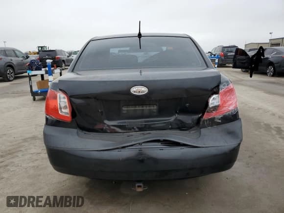 ✅ 2007 Kia Rio LX • VIN: KNADE123876240451 • Lot: 57044685. Wystawiony na Copart z przebiegiem Nie podano. Bezpłatny archiwum sprzedaży aukcyjnych z USA i szczegółowy raport historii pojazdu na DreamBid. Zdjęcie 6.