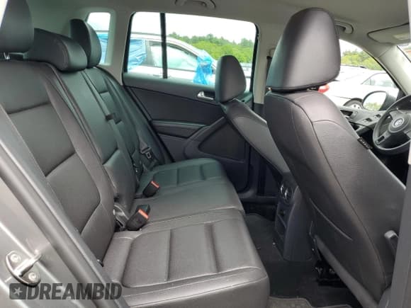 ✅ 2012 Volkswagen Tiguan LE • VIN: WVGAV7AXXCW005049 • Lot: 57818925. Listed on Copart with 137,850 mi. Free auction sales archive from the USA and detailed vehicle history report at DreamBid. Image 11.